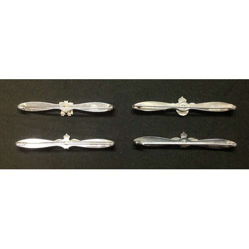 128 - WW2 RAF Sweetheart wing collection: four tie pins all in the form of a propeller blade. Each has a d... 