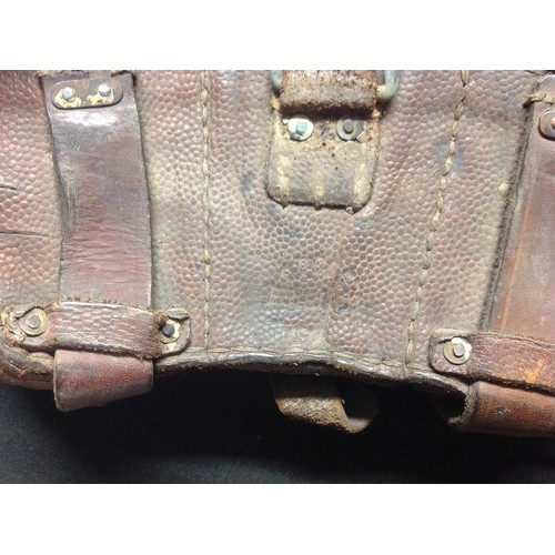 144 - WW2 British / US / German leatherwork collection to comprise of: two leather shoulder holsters, both... 