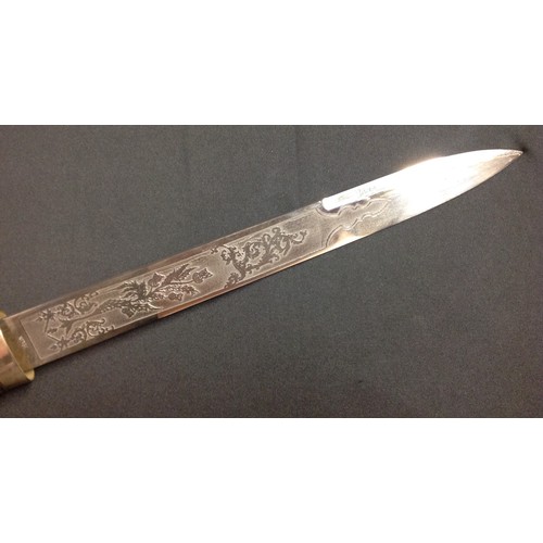 191 - REPRODUCTION Victorian Scottish Officers Dirk. 295mm blade with etched decorative panels to each sid... 