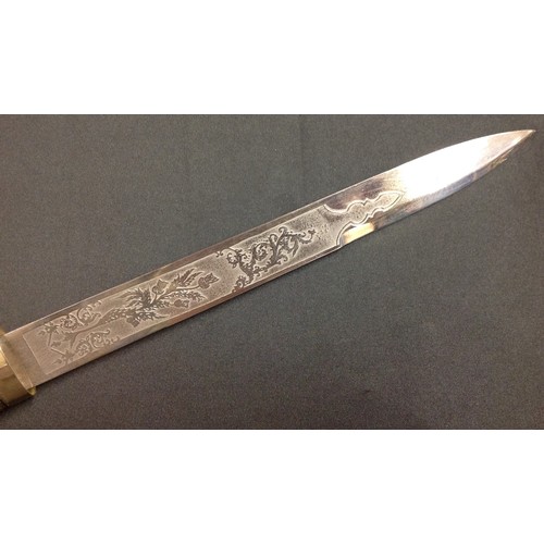 191 - REPRODUCTION Victorian Scottish Officers Dirk. 295mm blade with etched decorative panels to each sid... 