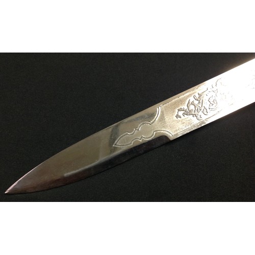 191 - REPRODUCTION Victorian Scottish Officers Dirk. 295mm blade with etched decorative panels to each sid... 