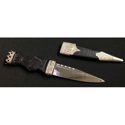 193 - Scottish Sgian-dubh Knife with 85mm long single edged blade with fuller and notched decoration to up... 