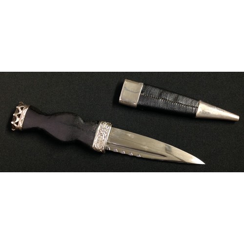 193 - Scottish Sgian-dubh Knife with 85mm long single edged blade with fuller and notched decoration to up... 