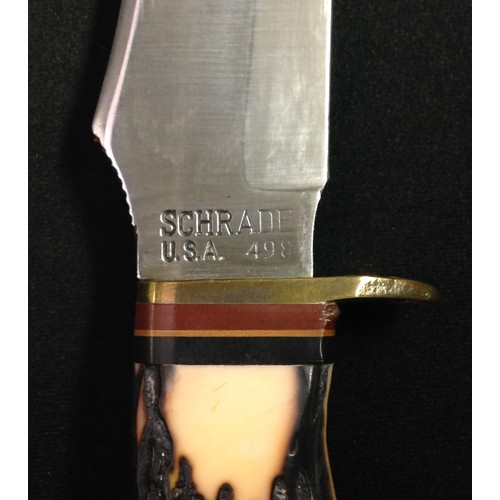 205 - Hunting Knife with 127mm long Bowie style blade with makers mark and model number 