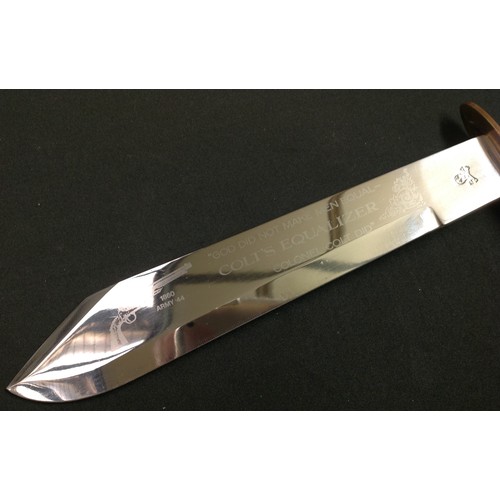 211 - Bowie Knife with 266mm long blade with a die stamped Skull & Crossbones to the ricasso and an etched... 