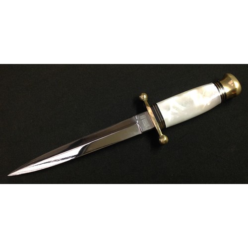 215 - Hunting knife with double edged blade 153mm in length, ricasso is maker marked 