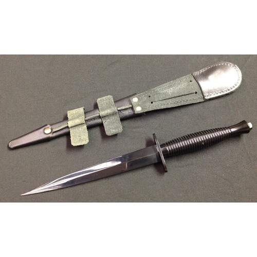 219 - Post War Third pattern Fairbairn - Sykes Knife with double edged 175mm long blade. Crossguard is mak... 