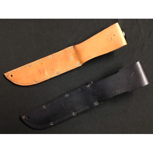 221 - US Ka-Bar Fighting Knife with fullered Bowie type blade with non reflective black finish marked 