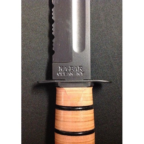 221 - US Ka-Bar Fighting Knife with fullered Bowie type blade with non reflective black finish marked 