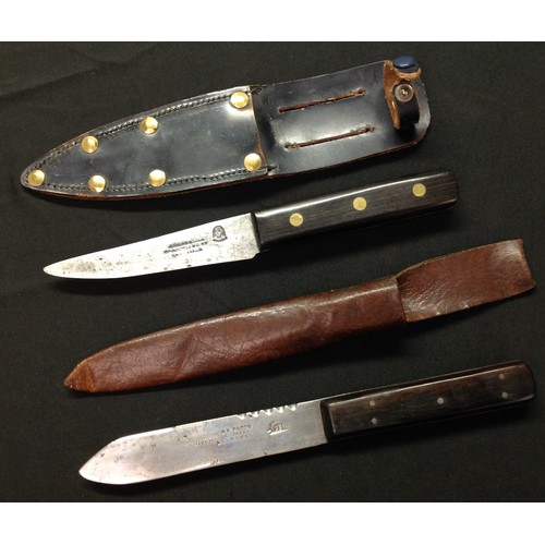 226 - Two hunting knives: one with single edged blade 115mm in length, Sheffield maker marked, wooden grip... 