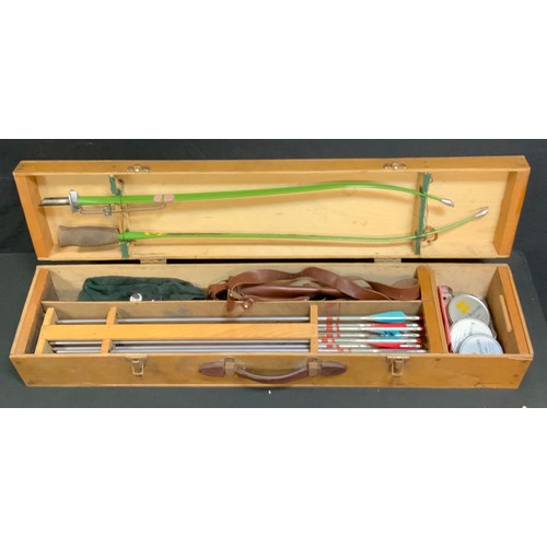 62 - A vintage Apollo Kestrel silver Streak archery set, cased;  cap with vintage enamel pin badges etc