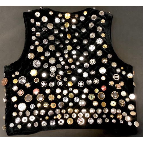 86 - Fashion & Textiles  - a black Mia Cassara velvet waistcoat hand decorated throughout with assorted s... 