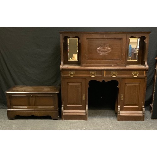 96 - An Arts and crafts oak bureau cupboard, rectangular top above a fall front enclosing a writing surfa... 