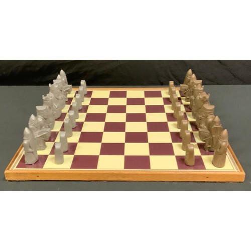98 - A German Medieval style Knights chess set wit board, king 84mm high