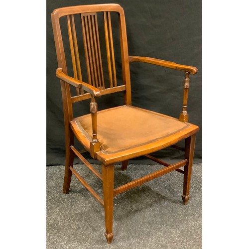 99 - An Edwardian mahogany open arm chair, outlined throughout with ebony and boxwood stringing, tapered ... 