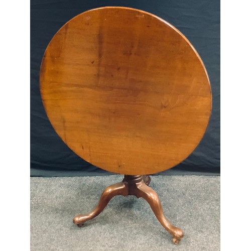 142 - A 'George III' oak tripod occasional table, circular tilting top, cylindrical column, cabriole legs,... 