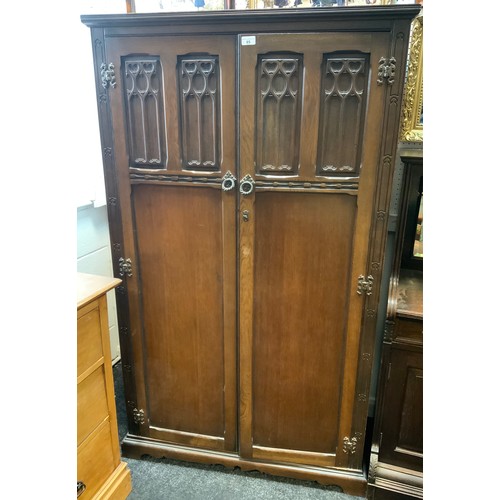 85 - An oak gentleman's wardrobe, 161cm high, 95cm wide.