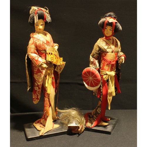 184 - A pair of Japanese Geisha dolls, in traditional costume, 45cm