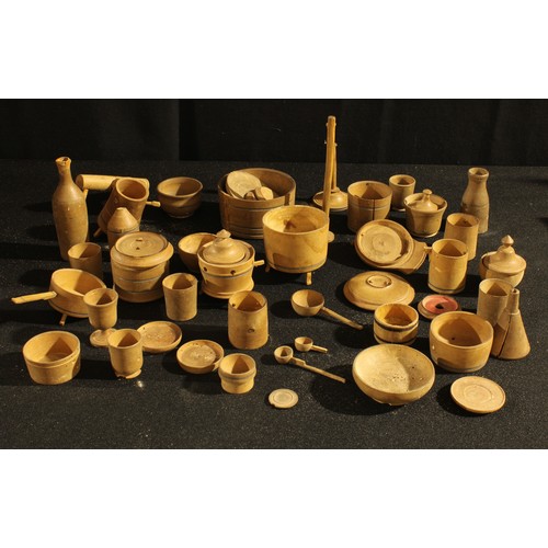 187 - Treen - a collection of boxwood miniature domestic vessels and utensils