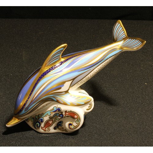 202 - A Royal Crown Derby paperweight, Bottlenose Dolphin, gold stopper