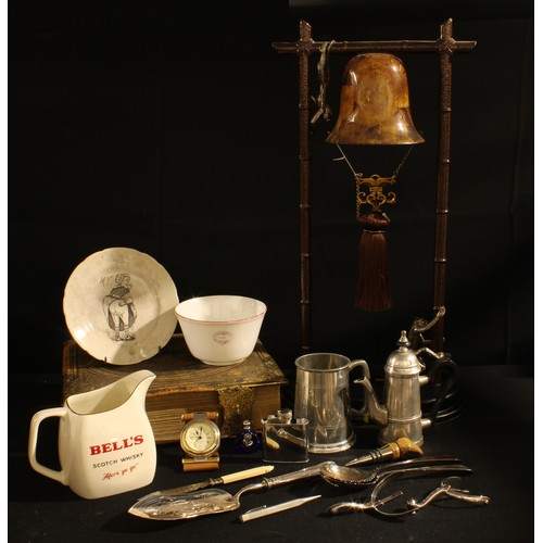 189 - Boxes and Objects - a pair of early 20th century spurs; a Maitland-Smith 'monkies' table lamp; a hum... 