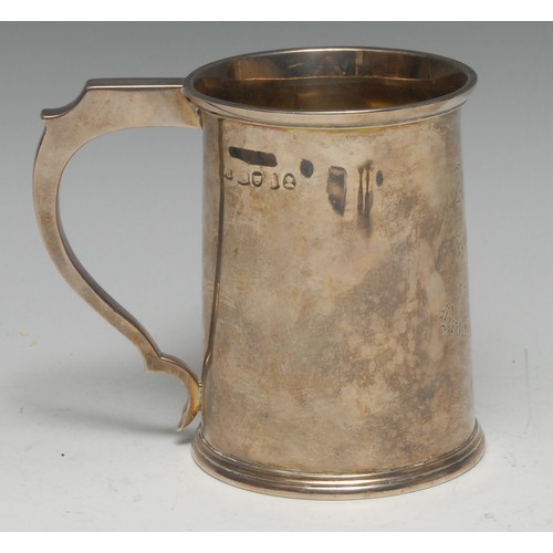 192 - A William IV silver cylindrical mug, flared rim, angular scroll handle, skirted base, Masonic inscri... 