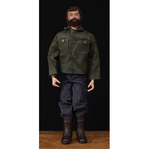 2049 - A 1970's Palitoy Action Man, brown flock hair and beard, painted blue eyes, hard plastic hands, wear... 
