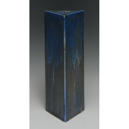 99 - A Ruskin matt crystalline triangular prism shaped lamp base, in mottled blue and ochre, 25cm high, i... 