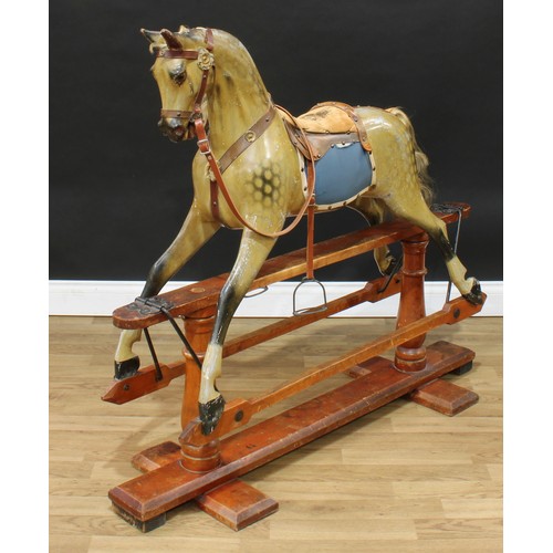 2152 - A late 19th/early 20th century English rocking horse on safety stand, probably by F H Ayres, the car... 