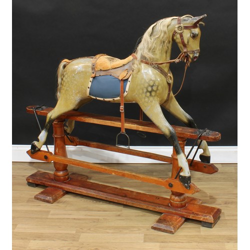 2152 - A late 19th/early 20th century English rocking horse on safety stand, probably by F H Ayres, the car... 