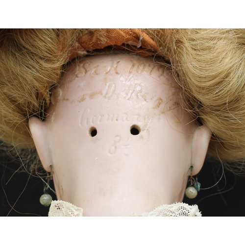 2167 - A Simon & Halbig (Germany) bisque head and painted composition bodied doll, weighted brown glass sle... 
