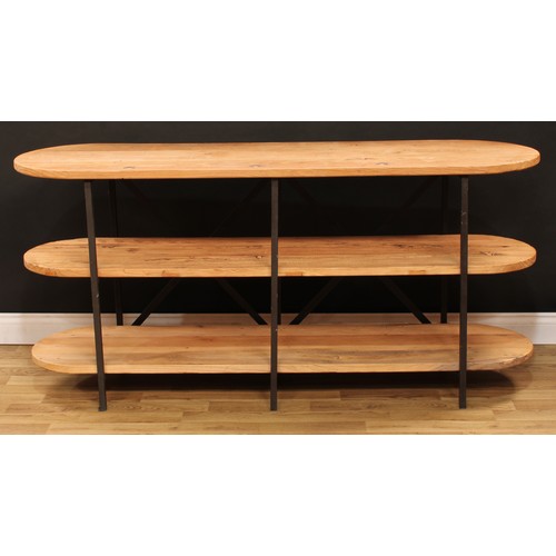 111 - An industrial design softwood and metal open bookcase or three-tier side table, discorectangular pla... 