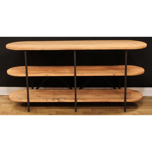 112 - An industrial design softwood and metal open bookcase or three-tier side table, discorectangular pla... 