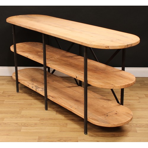 112 - An industrial design softwood and metal open bookcase or three-tier side table, discorectangular pla... 