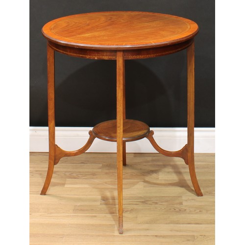 113 - An Edwardian satinwood crossbanded mahogany circular centre table, 71cm high, 61cm diameter