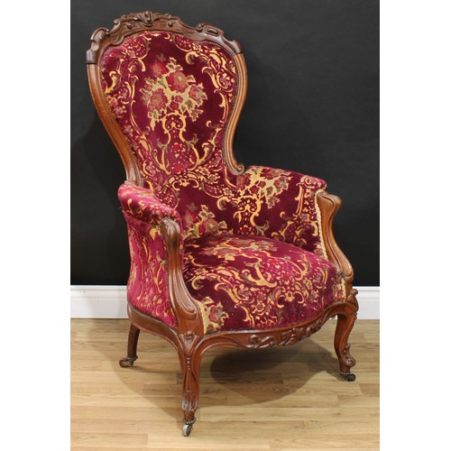 116 - A Victorian spoon back drawing room chair, 111cm high, 65cm wide, the seat 42cm wide and 38cm deep