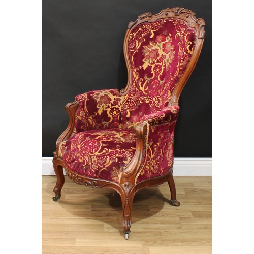 116 - A Victorian spoon back drawing room chair, 111cm high, 65cm wide, the seat 42cm wide and 38cm deep