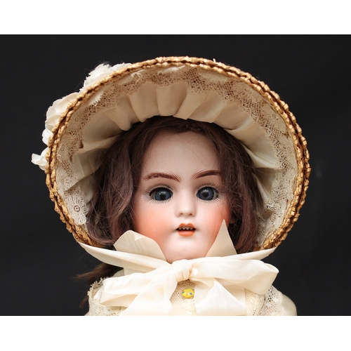 2217 - A Simon & Halbig (Germany) bisque head and ball jointed painted composition bodied doll, weighted sl... 