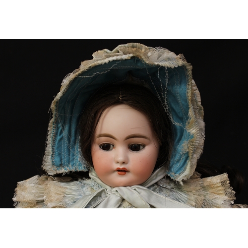 2222 - A Simon & Halbig (Germany) bisque shoulder head and part kid leather/painted composition bodied doll... 