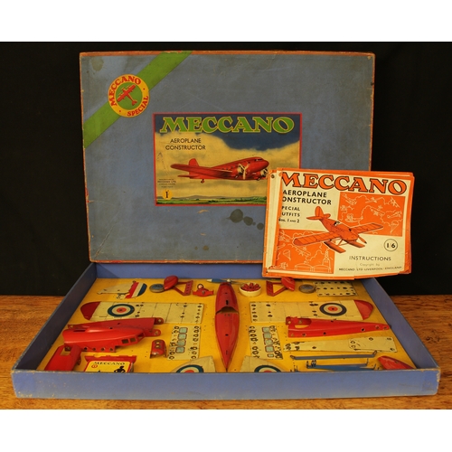 2231 - A 1930's Meccano No.1 Special aeoplane constructor outfit, comprising various red, blue and cream ou... 