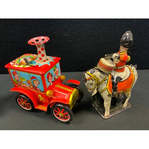 79 - Toys & Juvenalia - a collection of tinplate toys including a KO (Japan) tinplate and fixed clockwork... 