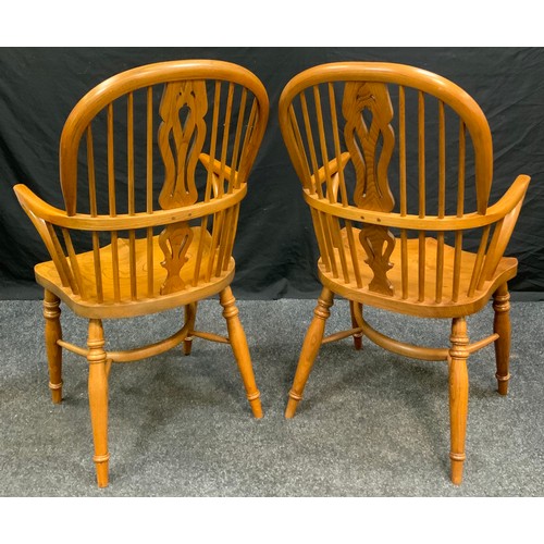 167 - A pair of John Parkin 18th century style windsor chairs