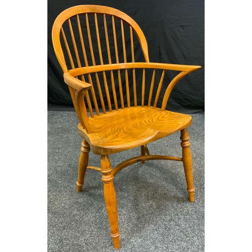 171 - A set of four John Parkin stick back windsor chairs; another pair (6)