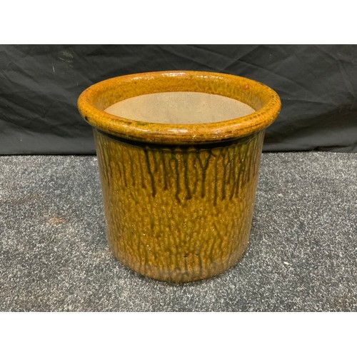 240 - Garden planters and plant pots; 24 plant pots, various sizes and glazes, the largest measuring 38cm ... 