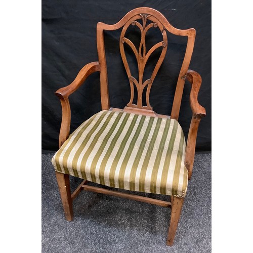 273 - A set of four Regency mahogany dining chairs, drop in seats, c.1815;  a Hepplewhite elbow chair;  a ... 