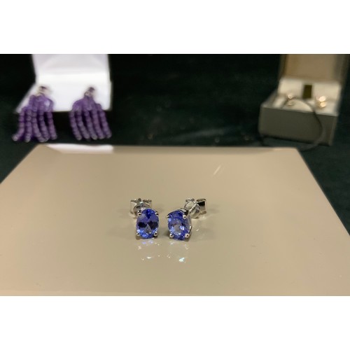 300 - A pair of QVC tanzanite purple 9ct white gold set earrings;  others Clogau 925 silver and gold cz st... 