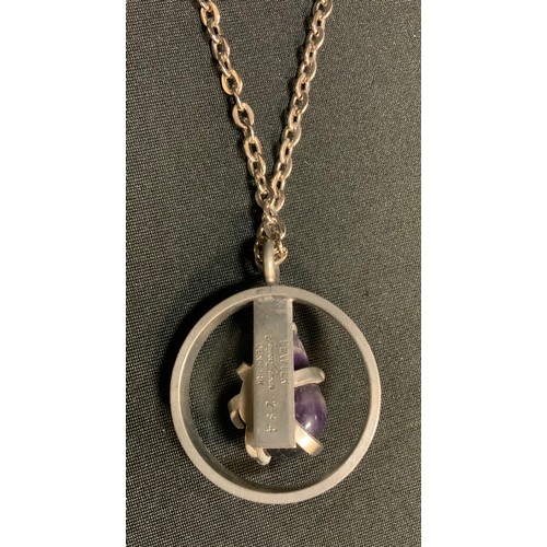 320 - A 1960s Georg Jensen amethyst and pewter pendant necklace, number 294, impressed verso, suspended fr... 