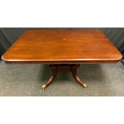 198A - A reproduction mahogany centre table, rounded rectangular top, quartered column, out swept legs, bra... 