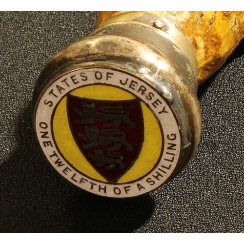 72 - A Channel Islands cabbage stalk walking cane, the pommel with an enameled coin, States of Jersey One... 