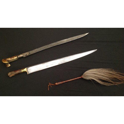 67 - Pair of Indo-Persian Short Swords and a Horse hair fly swatter. First Sword has a ear style grip wit... 